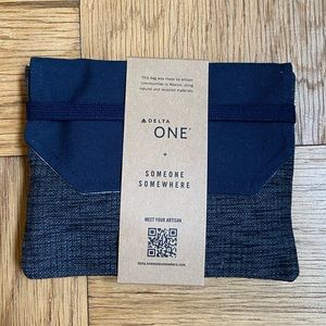 BRAND NEW! Never opened Delta One + Someone Somewhere first class amenity kit